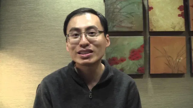 A Cooley Smiles patient speaking to camera in the practice consultation room.